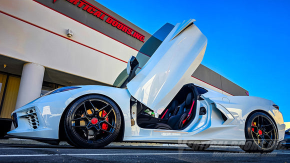 Chevrolet Corvette C8 2020–2026 with Vertical Door Conversion Kit installed at Vertical Doors, Inc. headquarters in Lake Elsinore, California; mid-engine C8 Stingray featuring true Lambo-style vertical doors by the original manufacturer, part number VDCCHEVYCORC820, compatible with 1LT, 2LT, 3LT, Z51, Z06, C8.R, ZR1, Stingray, and E-Ray trims.
